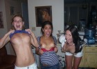 Cute teens flashing tits in party