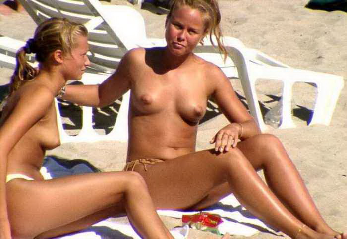 Beautiful babes topless on the sunny beaches
