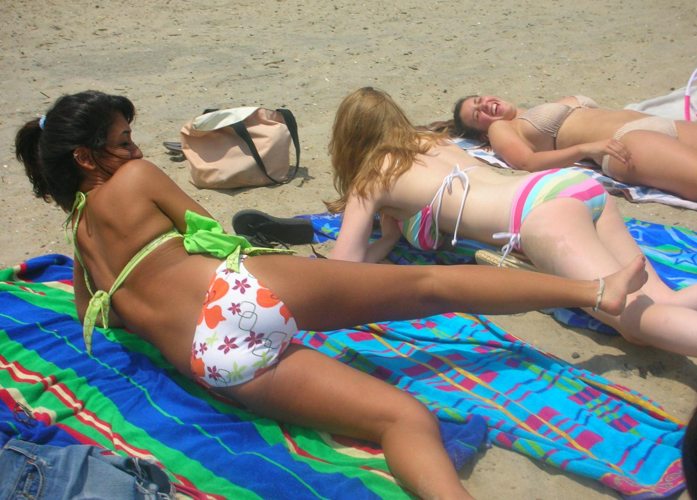 Hot naughty teens in sexy bikinis caught tanning on beach