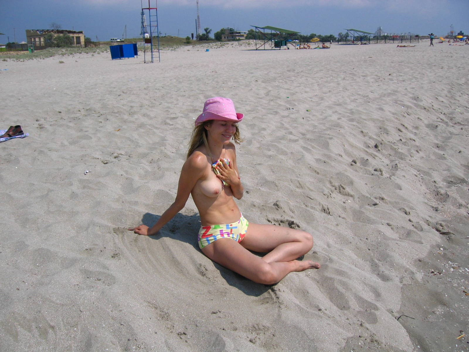 Sweet topless teen and her pink hat